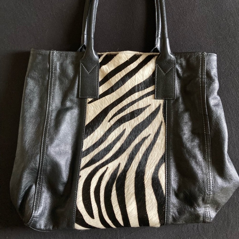 Genuine leather designer hand bag with zebra-printed cowhide stripe